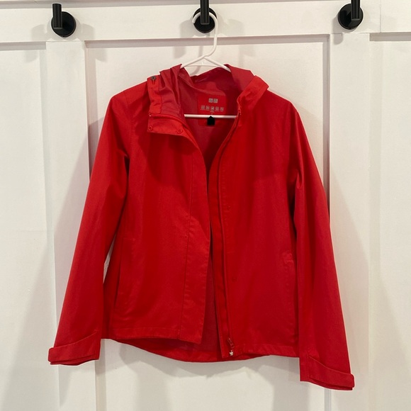 UNIQLO blood orange rain jacket - Picture 1 of 7